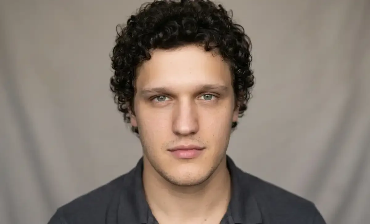 Antonio Marziale actor and filmmaker smiling in a portrait photo