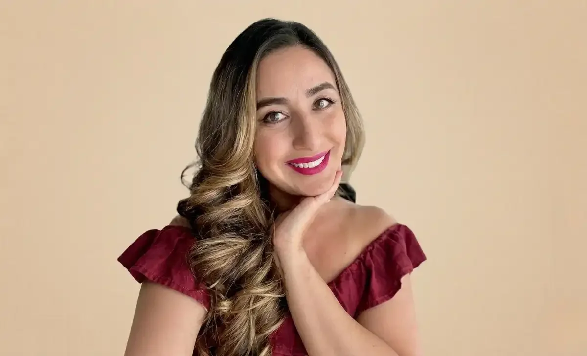 Micheline Maalouf therapist smiling warmly in a professional photo
