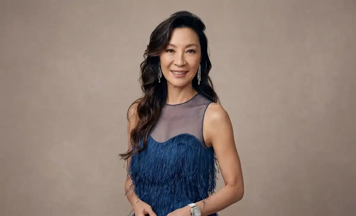 Michelle Yeoh at an awards event, reflecting her net worth and Oscar-winning career